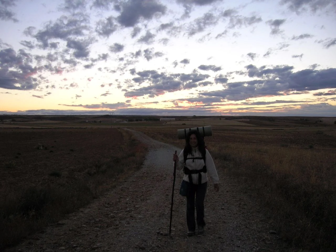 Pilgrim at dawn on the Camino de Santiago